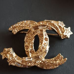 Chanel Gold Crystal Brooch So chic and style. This is a must have!!